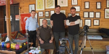 suya-yazilan-sanat-ile-yarim-asir.jpg