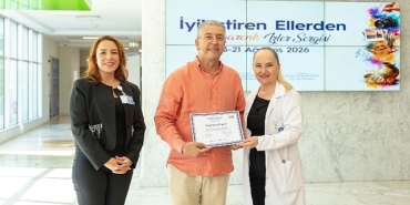 iyilestiren-ellerden-rengarenk-izler-sergisi-sanatseverlerle-bulustu.jpg